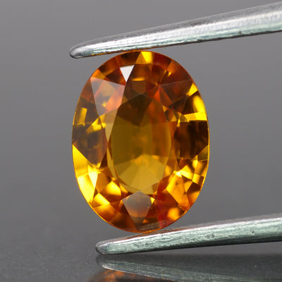 Sapphire | natural, orange color, oval-cut, 8x6mm, 1.5ct - Eden Garden Jewelry™