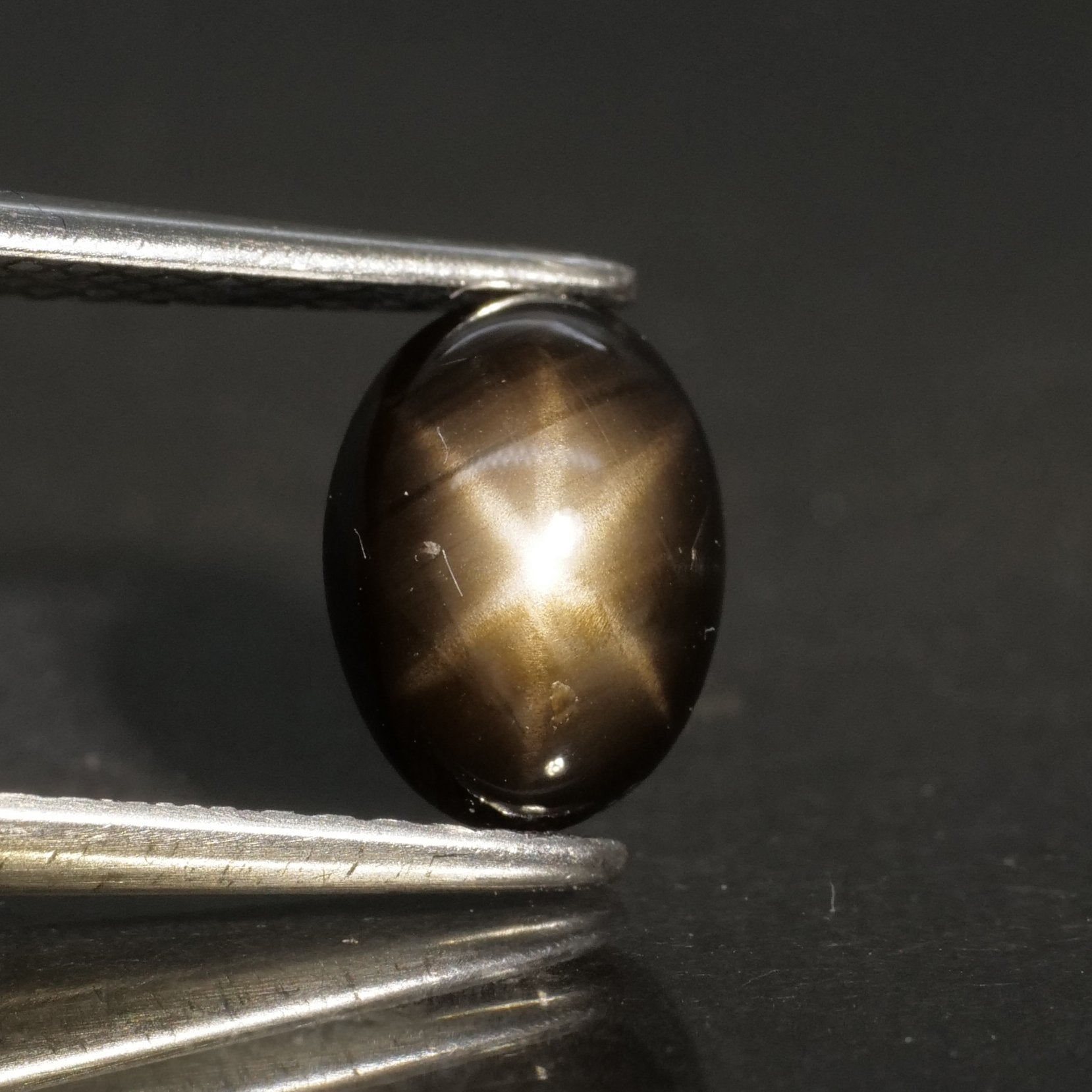Sapphire | black, star effect, oval cut 7x5mm, 1.20ct - Eden Garden Jewelry™