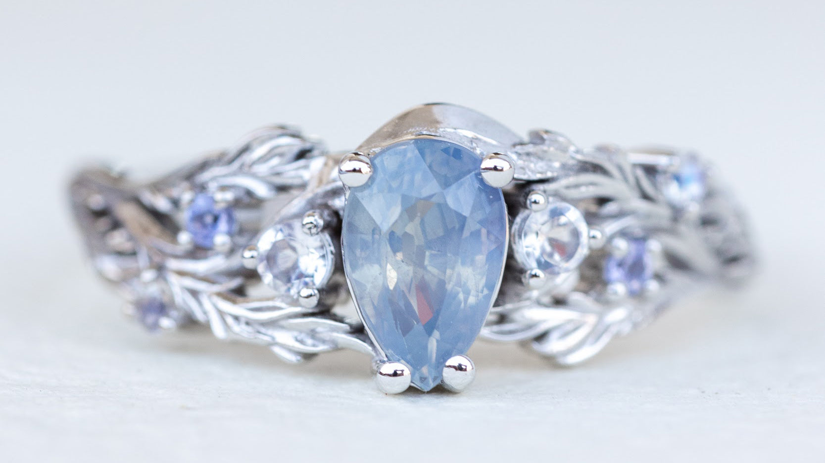 Mesmerizing Opalescent Sapphire Engagement Rings: Adding a Touch of Enchantment to Your Proposal