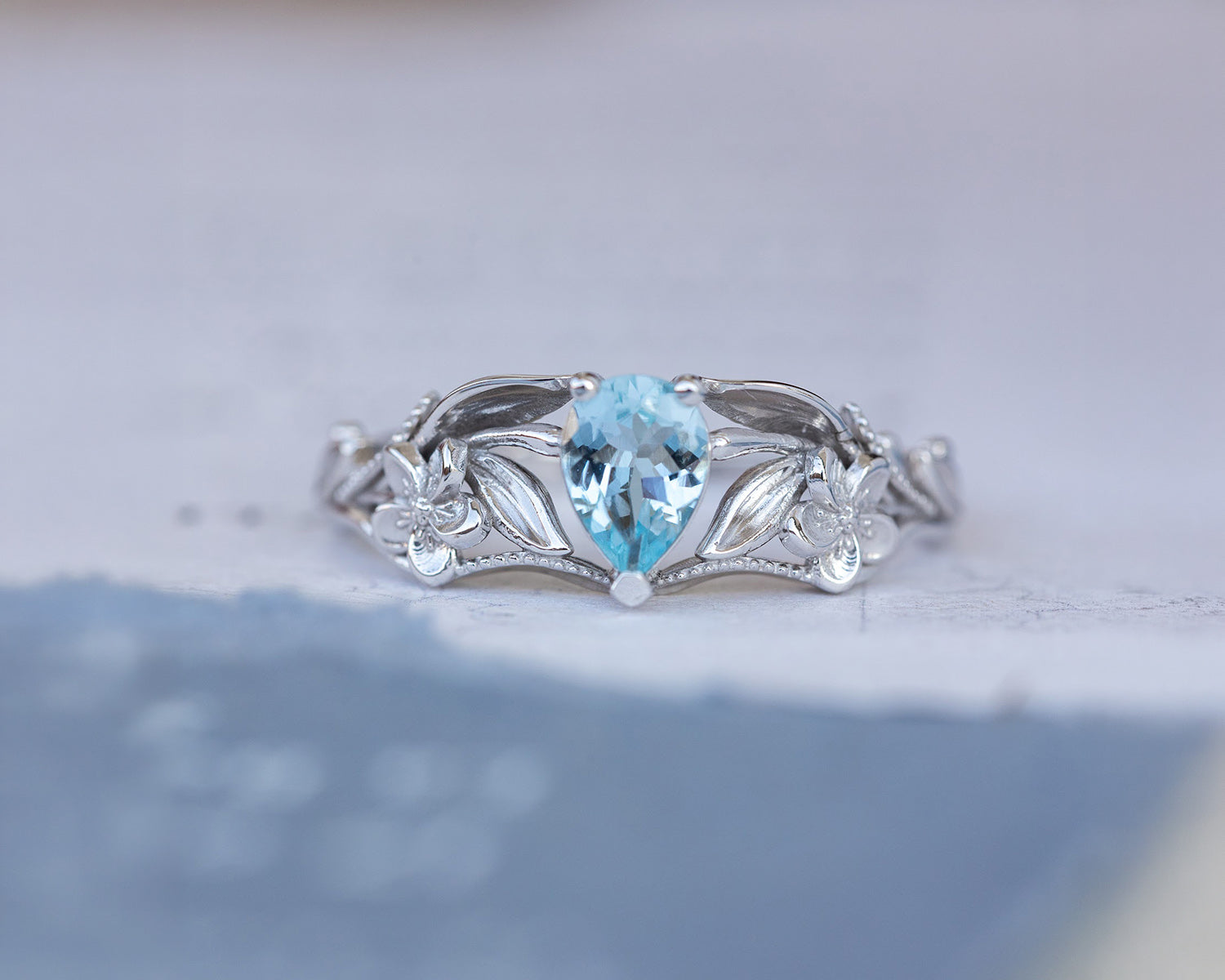 Alexandrite engagement ring with flowers