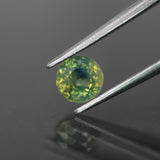 Opalescent Sapphire | natural,hazy waves: yellowish green color, round-cut, *5mm, 0.8ct, Madagascar