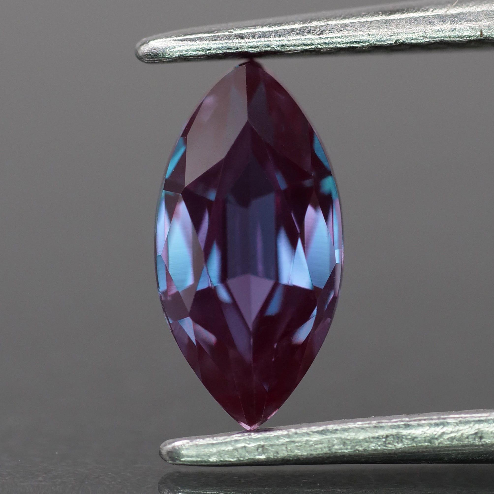 Alexandrite | lab created, colour changing, marquise-cut, 10x5mm, 1.2 ct