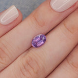 Opalescent sapphire | natural, purplish pink color, oval-cut, 8x5.5mm, 1.6ct