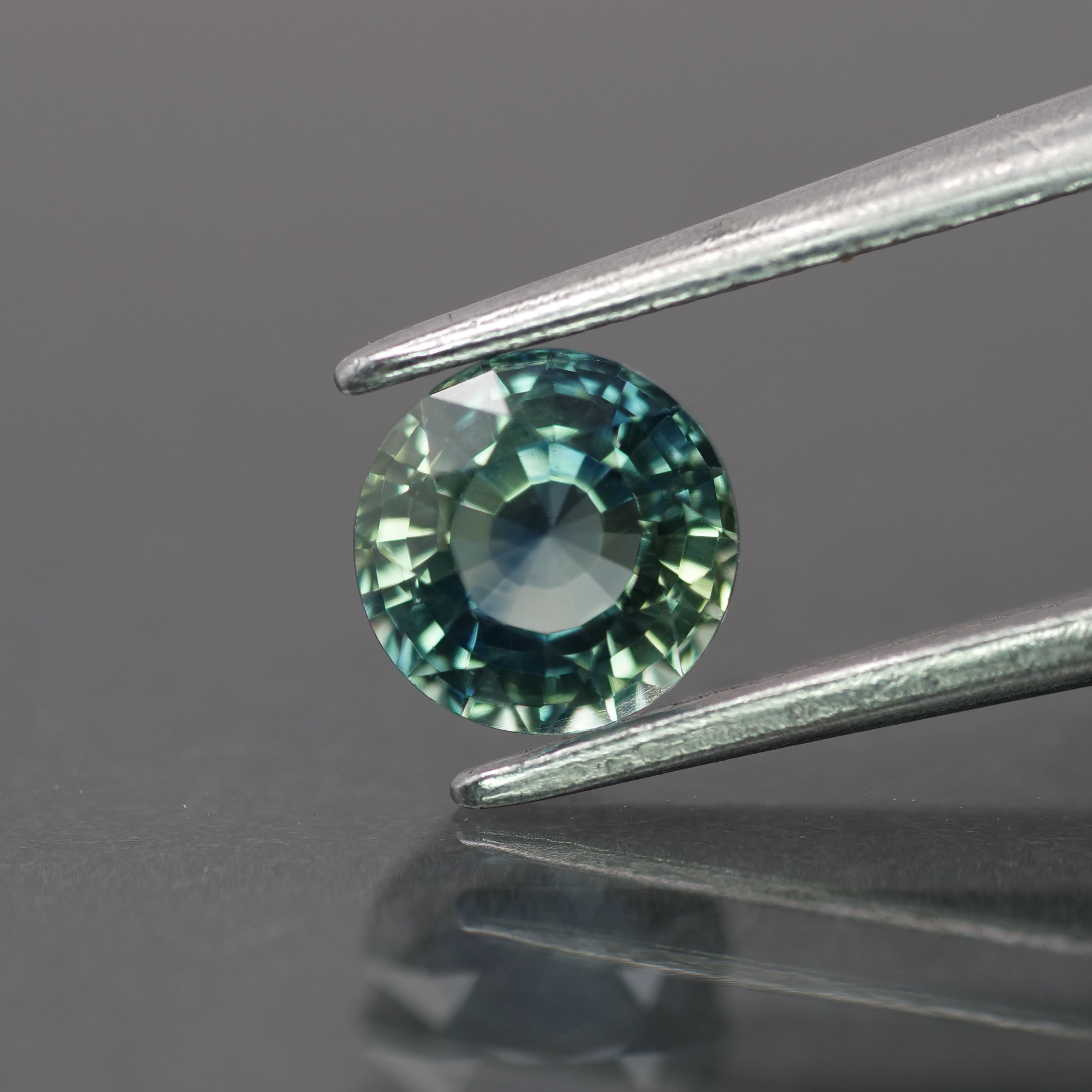 Sapphire | natural, teal color/color changing, round-cut, *5.5mm, 0.9ct - Eden Garden Jewelry™