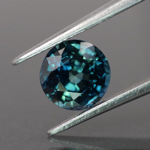 Sapphire | IGI certified | natural, teal color/color-changing, round-cut, *6.5mm, 1.48ct