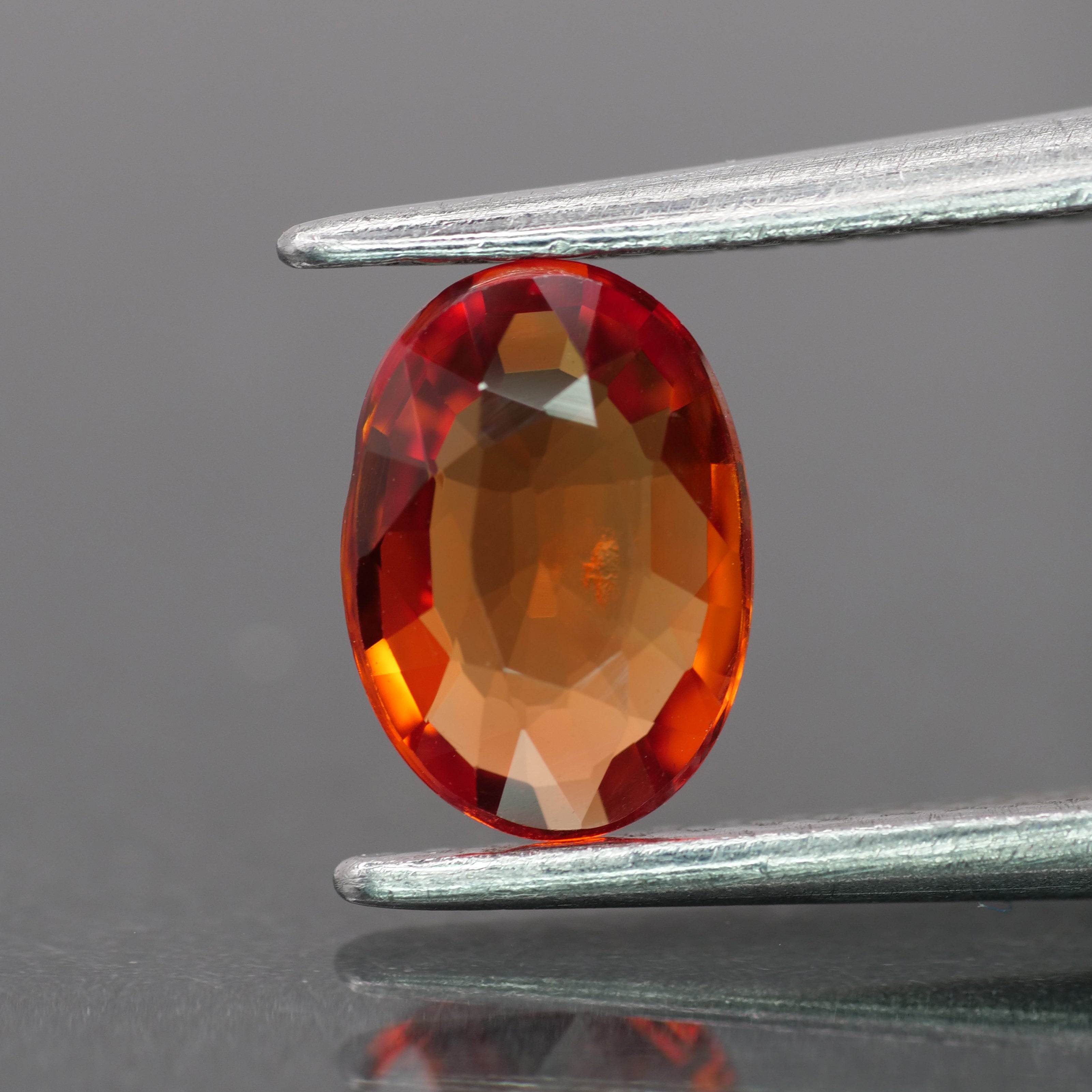 Sapphire | natural, orange color, oval-cut, 7x5mm, 0.7ct - Eden Garden Jewelry™