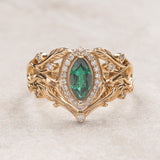 Marquise engagement ring with lab emerald and diamond halo / Callisto