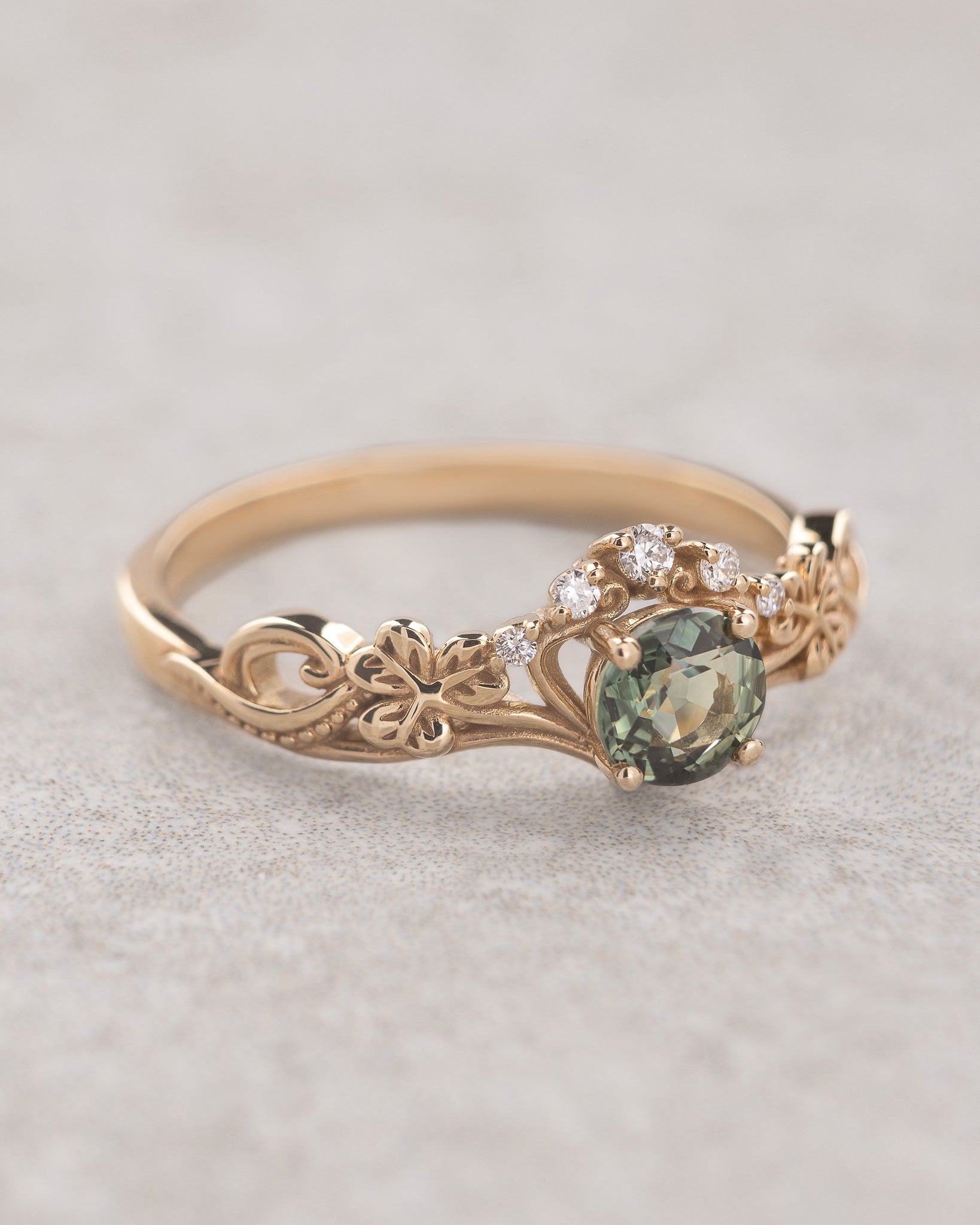 Irish engagement ring with green sapphire and diamonds / Horta