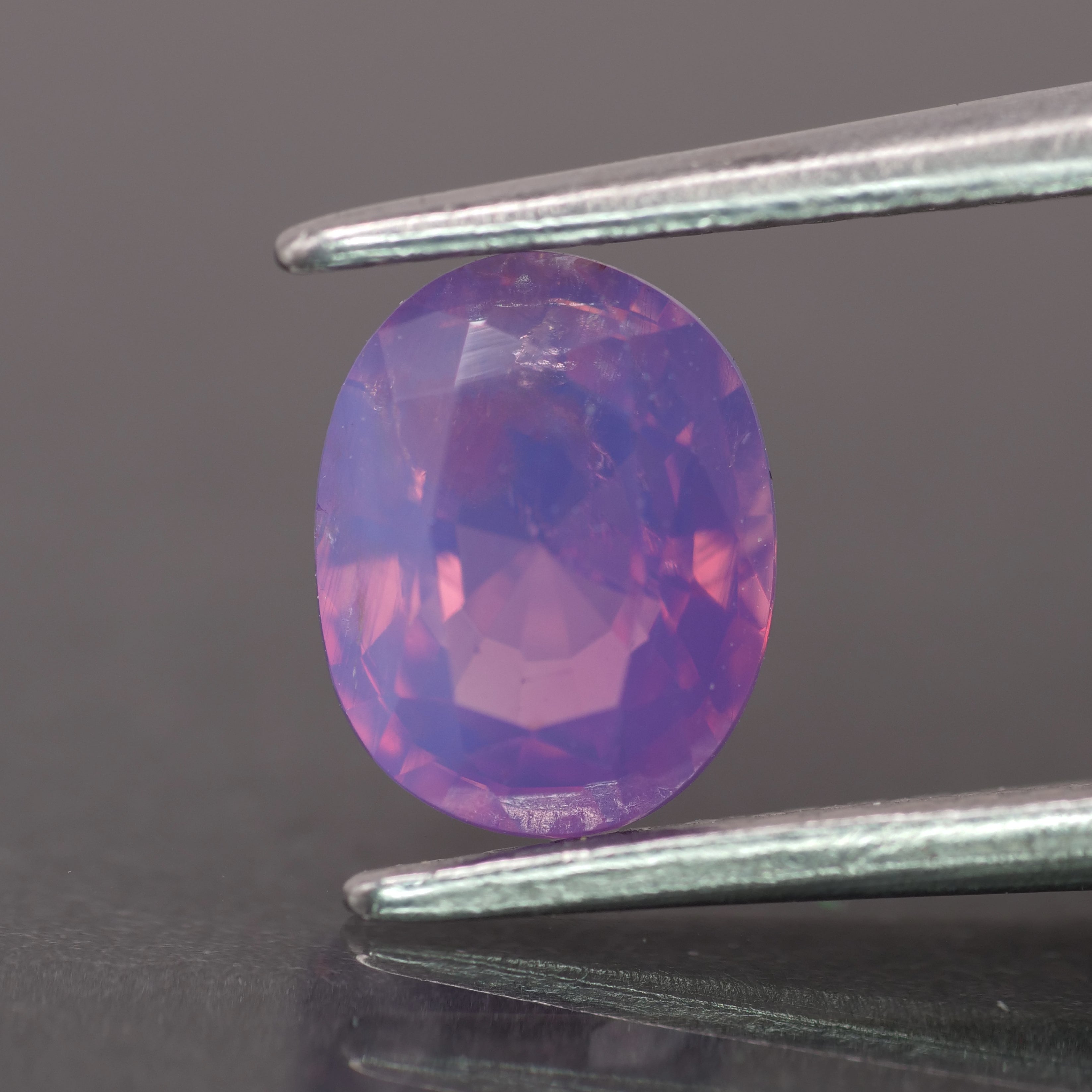 Opalescent sapphire | natural, purplish pink color, oval-cut, *7x5.5mm, 1.2ct - Eden Garden Jewelry™