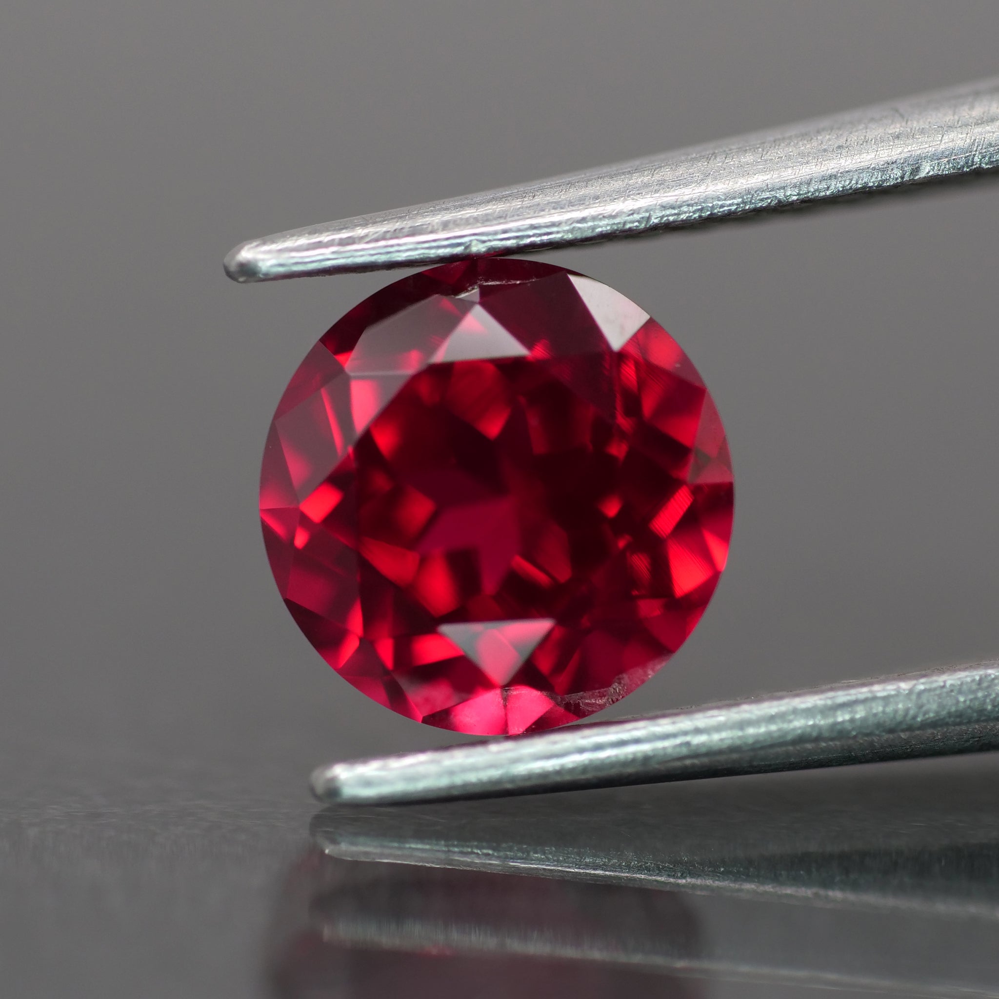 Ruby | red color, lab created, round-cut, 6.5mm, 1.7ct