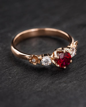 Passionate red ruby engagement ring on a floral diamond band / Fiorella