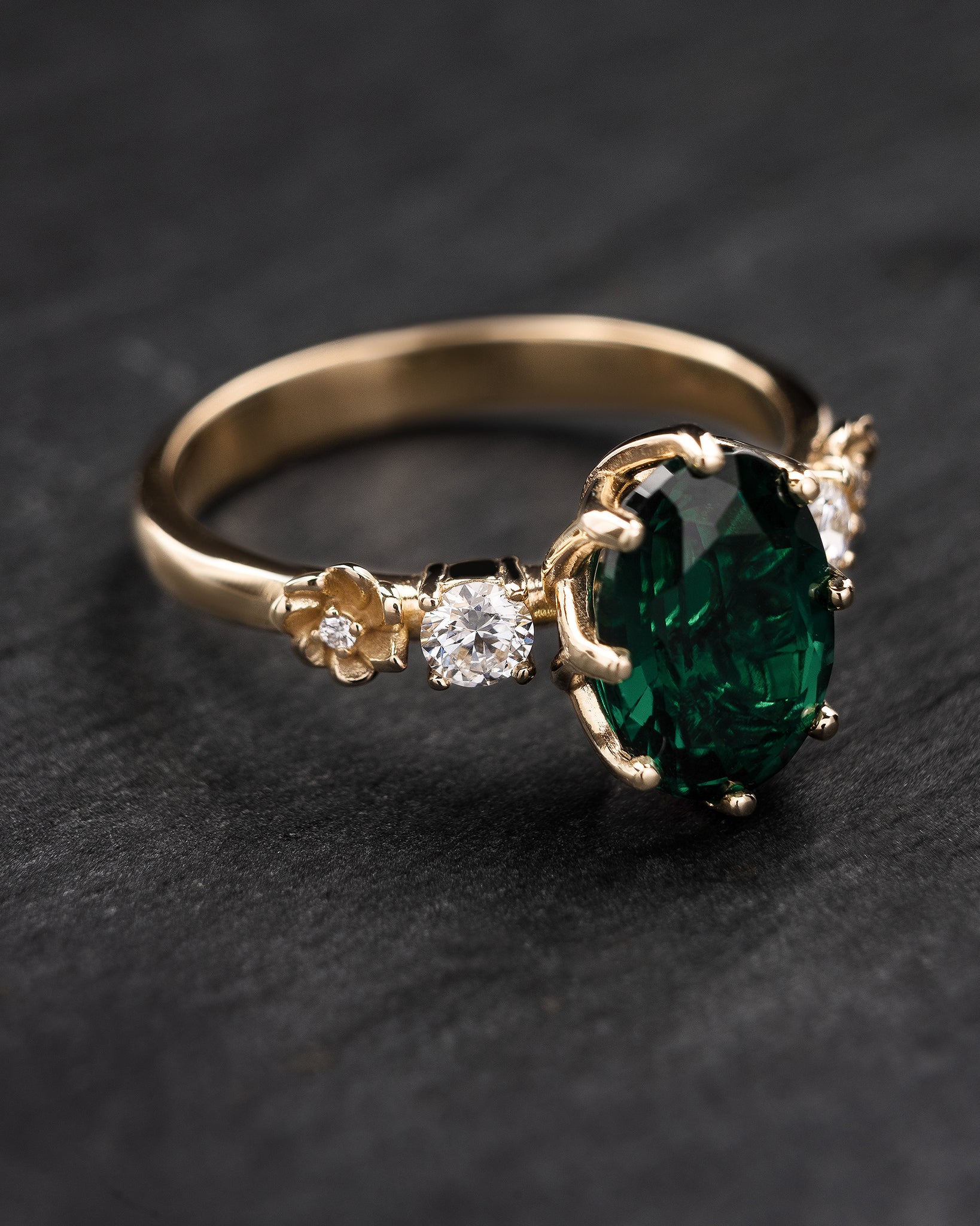 Gorgeous lab emerald engagement ring on a floral diamond band / Fiorella