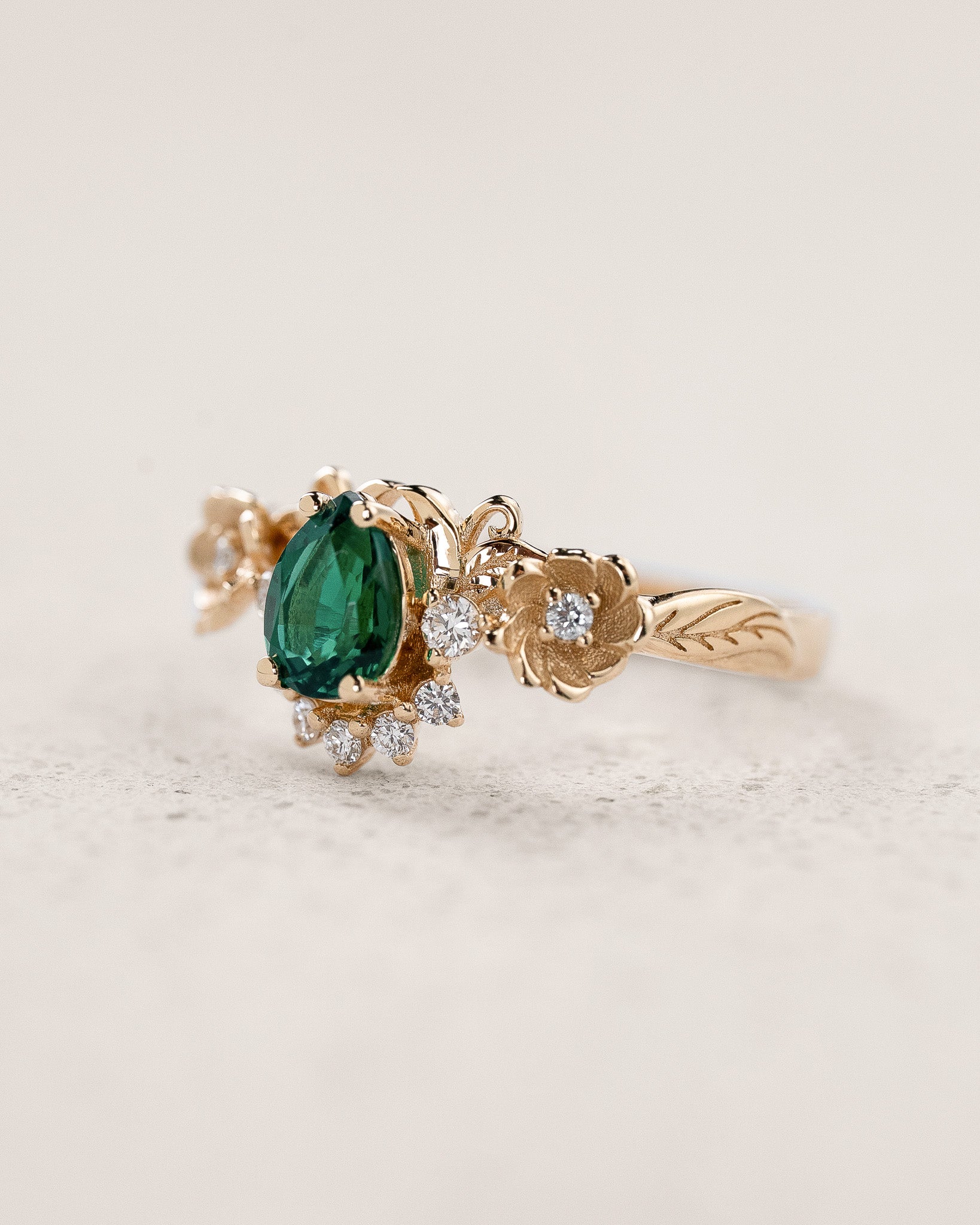 Floral Engagement Ring with Pear-Cut Emerald in Half-Halo Version / Adelina - Eden Garden Jewelry™
