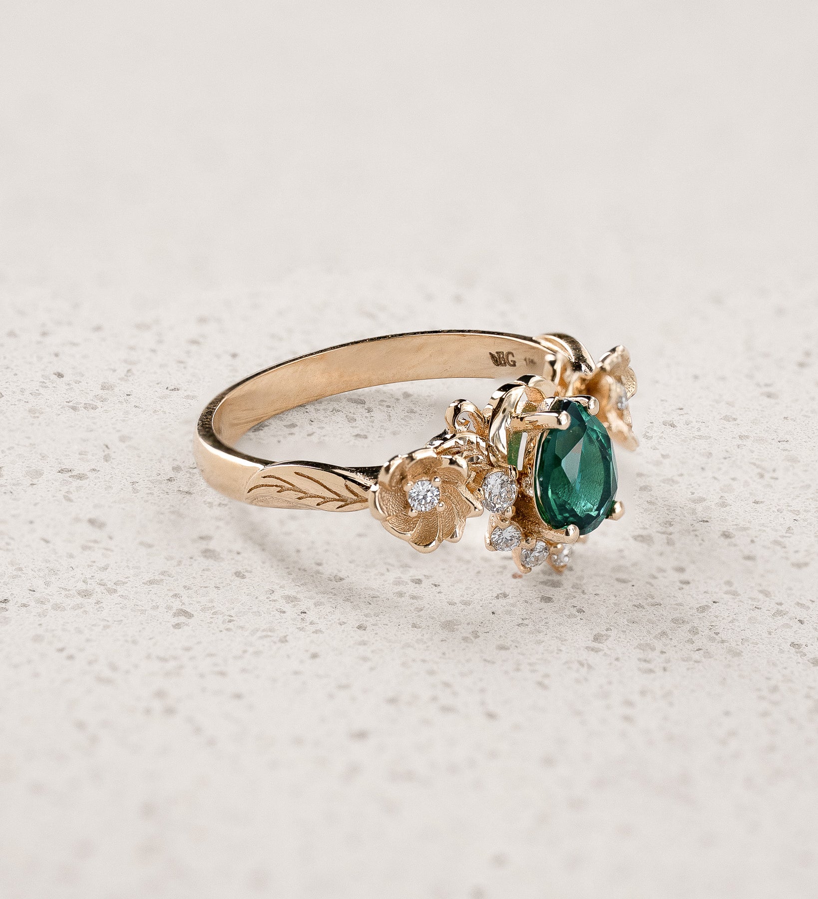 Floral Engagement Ring with Pear-Cut Emerald in Half-Halo Version / Adelina - Eden Garden Jewelry™