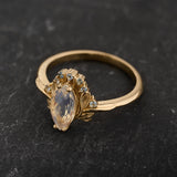 Flower-inspired Engagement Ring with Moonstone and Accent Aquamarines / Iris