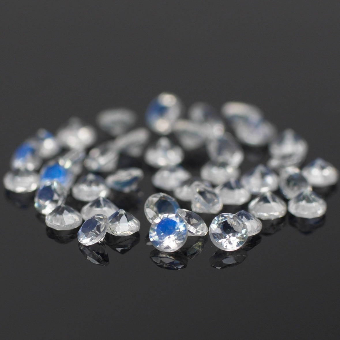 Moonstone | natural, round-cut, white/blue color, accent stone - Eden Garden Jewelry™