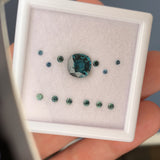 Custom order: Japanese Maple engagement ring with teal sapphires
