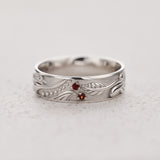 Nature inspired wedding band with garnets / Callisto