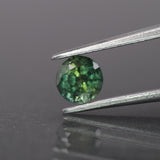 Sapphire | natural, bi-color teal sapphire, round-cut, 5mm, *0.65ct