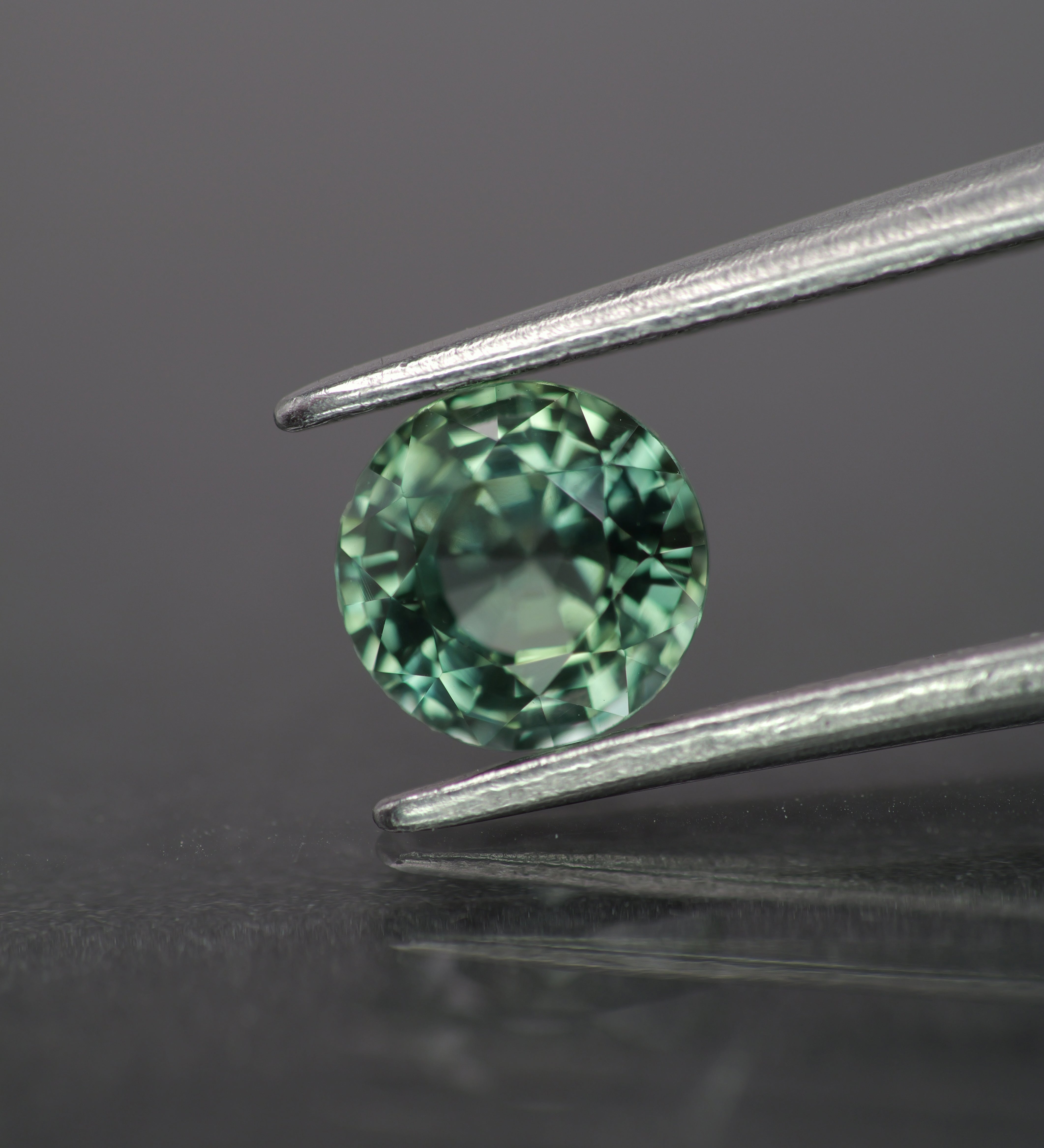 Sapphire | natural, teal color/color changing, round-cut, *5.5mm, 0.9ct - Eden Garden Jewelry™