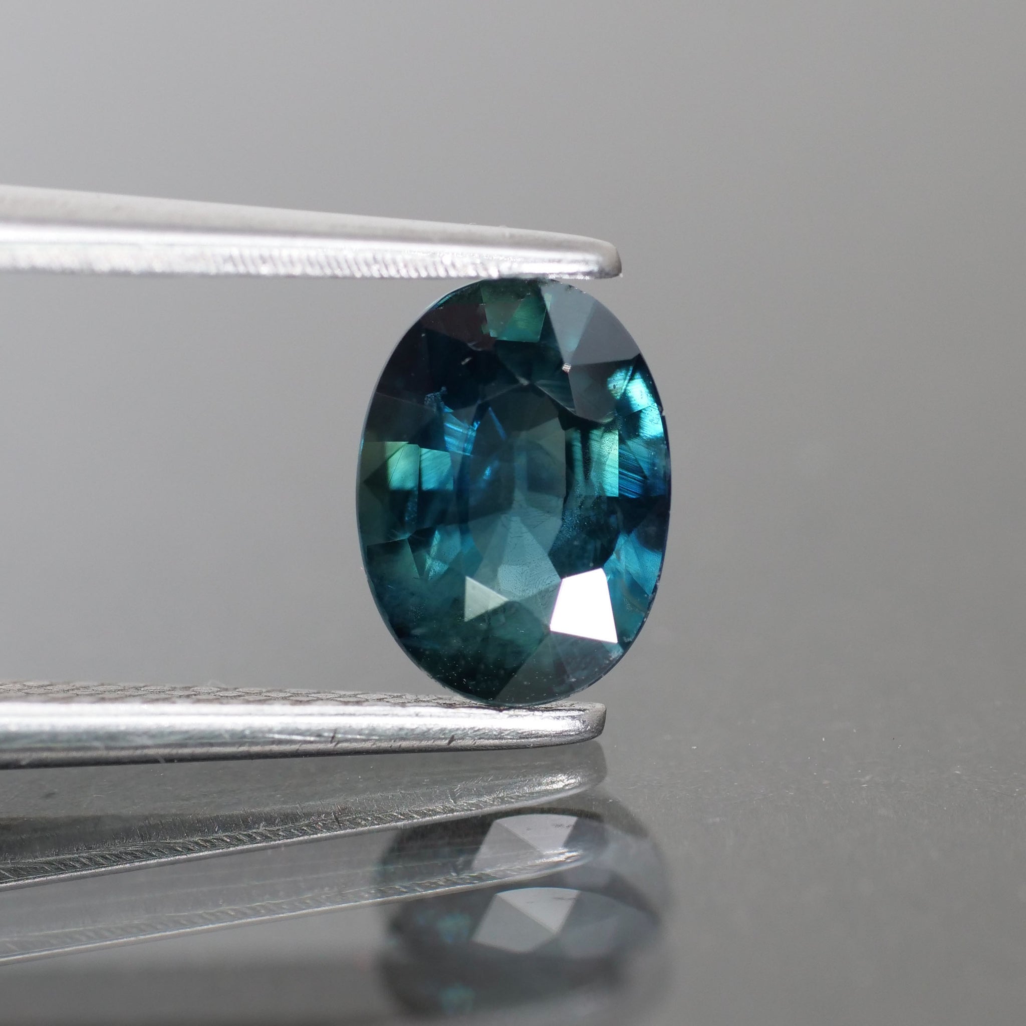Sapphire | natural, teal (bluish green color changing), oval cut 7x5 mm, 1ct, Thailand - Eden Garden Jewelry™