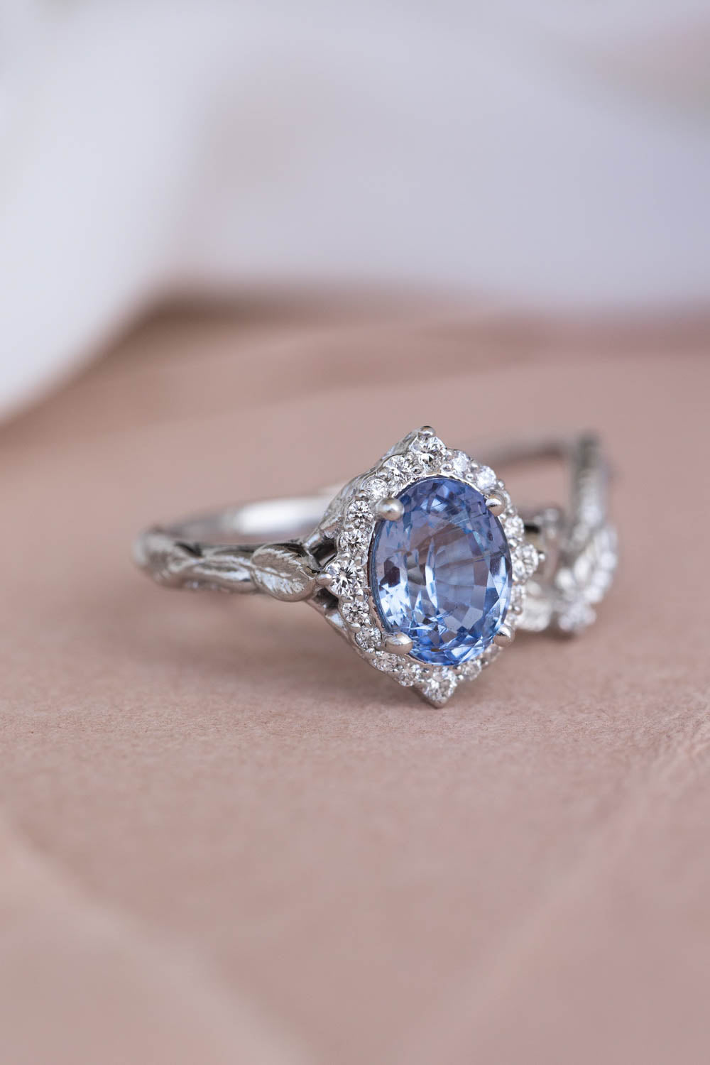 Halo Light Blue Oval Sapphire Ring - OROGEM Jewelers
