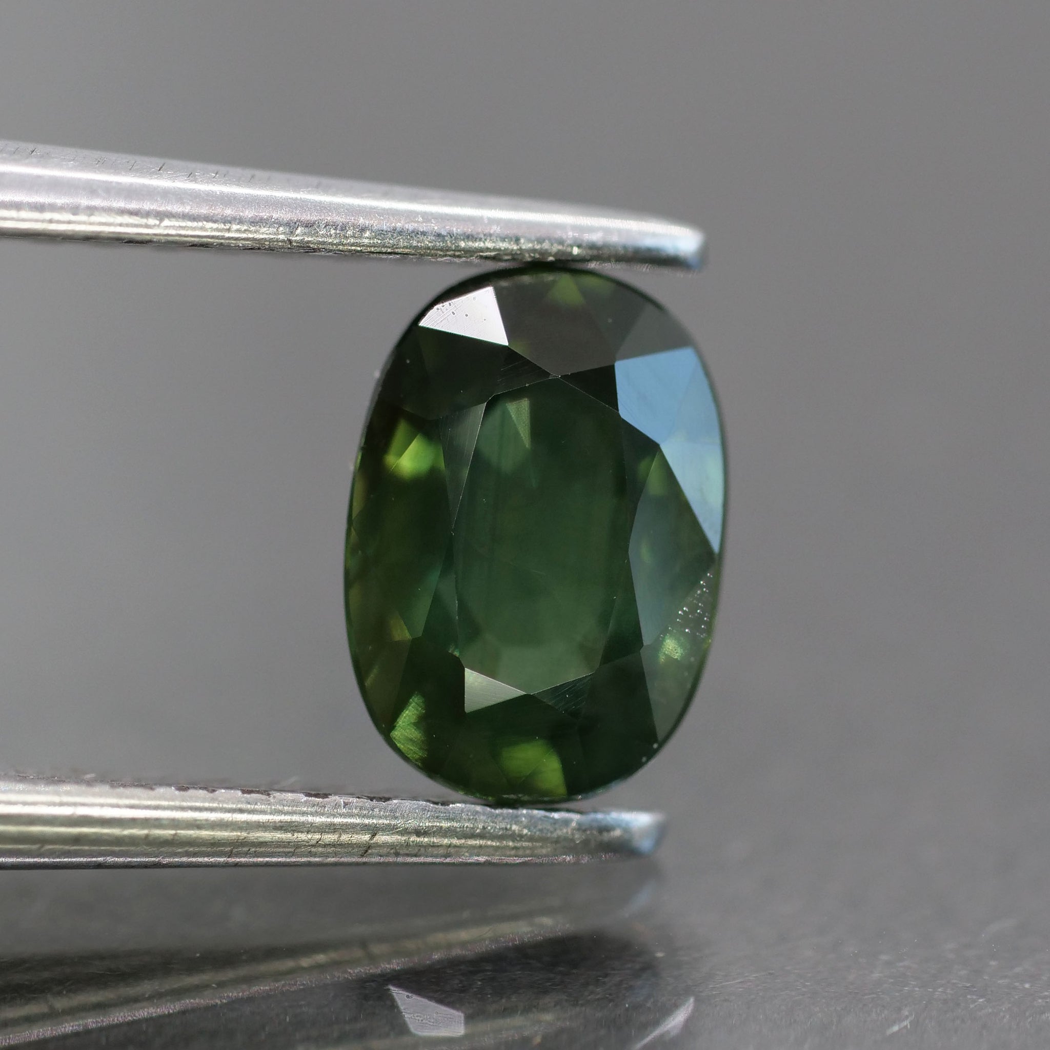 Sapphire | natural, deep green, oval cut 7x5 mm, VS, 1 ct, Madagascar - Eden Garden Jewelry™