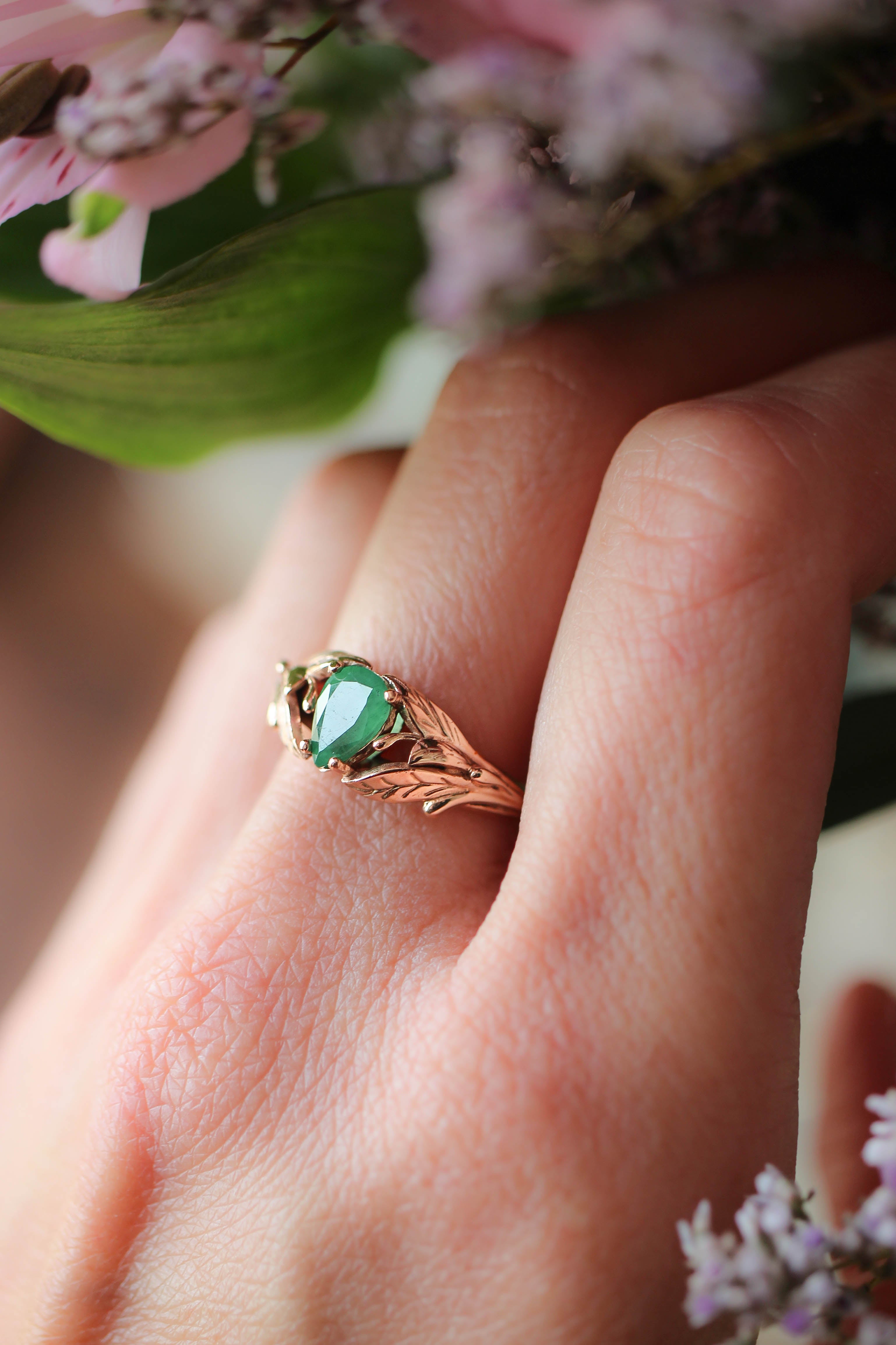 Pear cut emerald engagement ring, leaves wedding band for woman