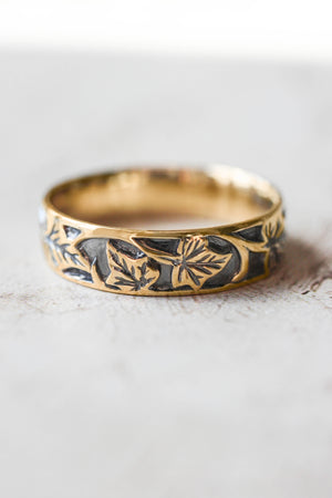 Wedding rings set for couples: black and gold ivy leaves band for him, ivy leaves band with sapphire and diamonds for her - Eden Garden Jewelry™