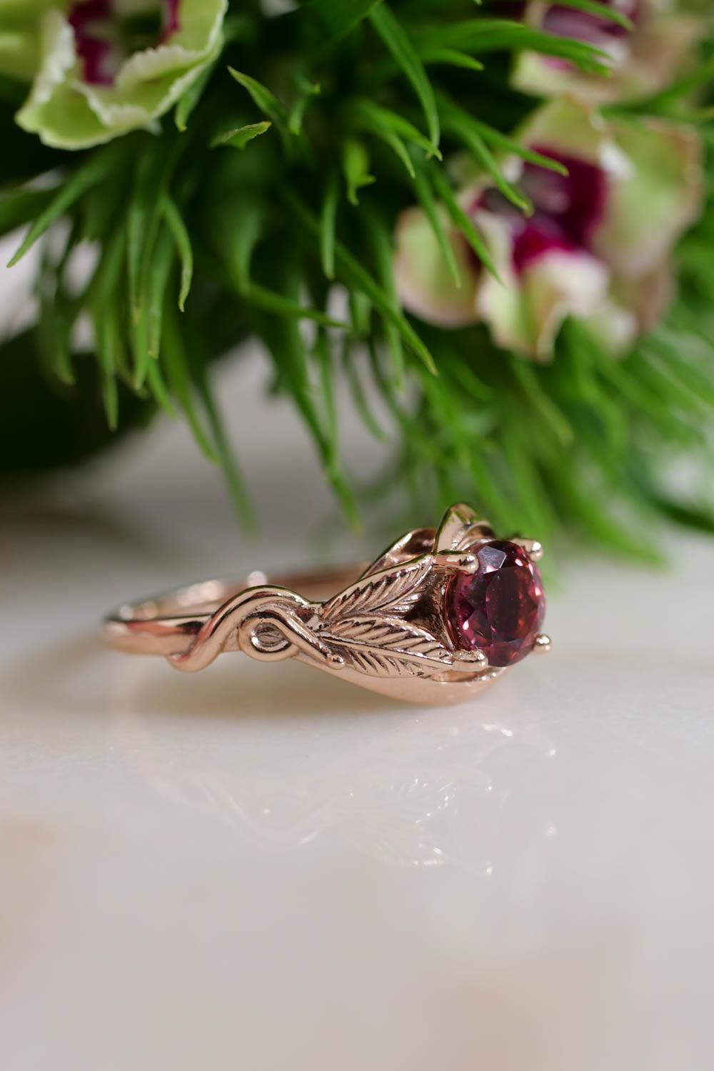 leaf engagement ring Azalea may be an exquisite and unique gift for your wife, bride, girlfriend or any other special woman in your life. Handcrafted from recycled solid gold it is adorned with round cut pink tourmaline