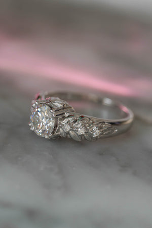 round engagement ring for women in white gold with nature inspired details