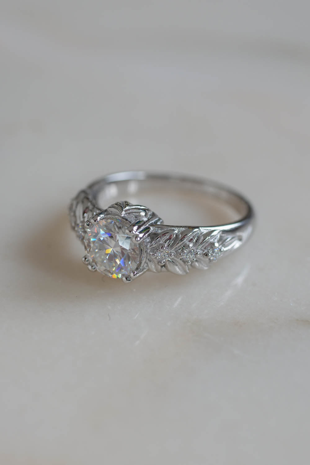 White gold moissanite engagement ring, round cut