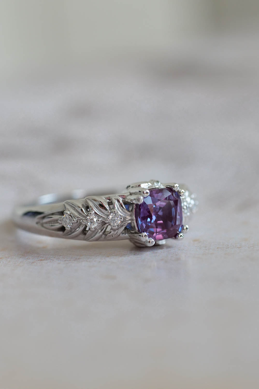 Silvestra is handmade engagement ring, mde of white gold with lab created alexandrite and small diamonds