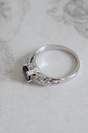 round engagement ring with alexandrite and diamonds