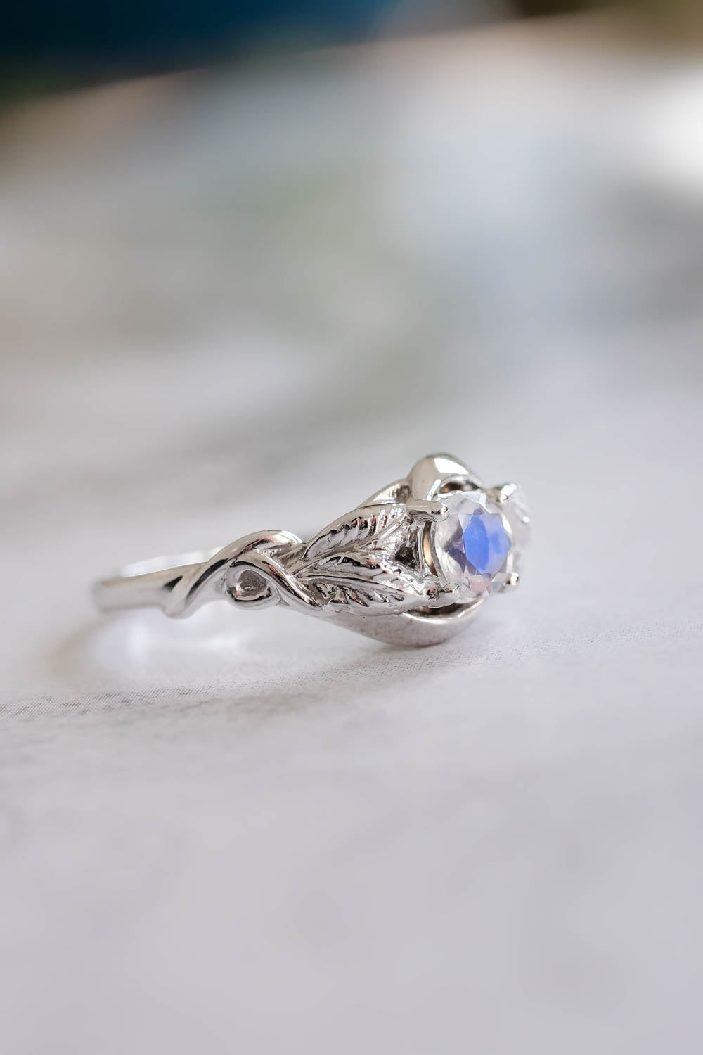 white gold nature inspired moonstone hand carved leaves engagement ring