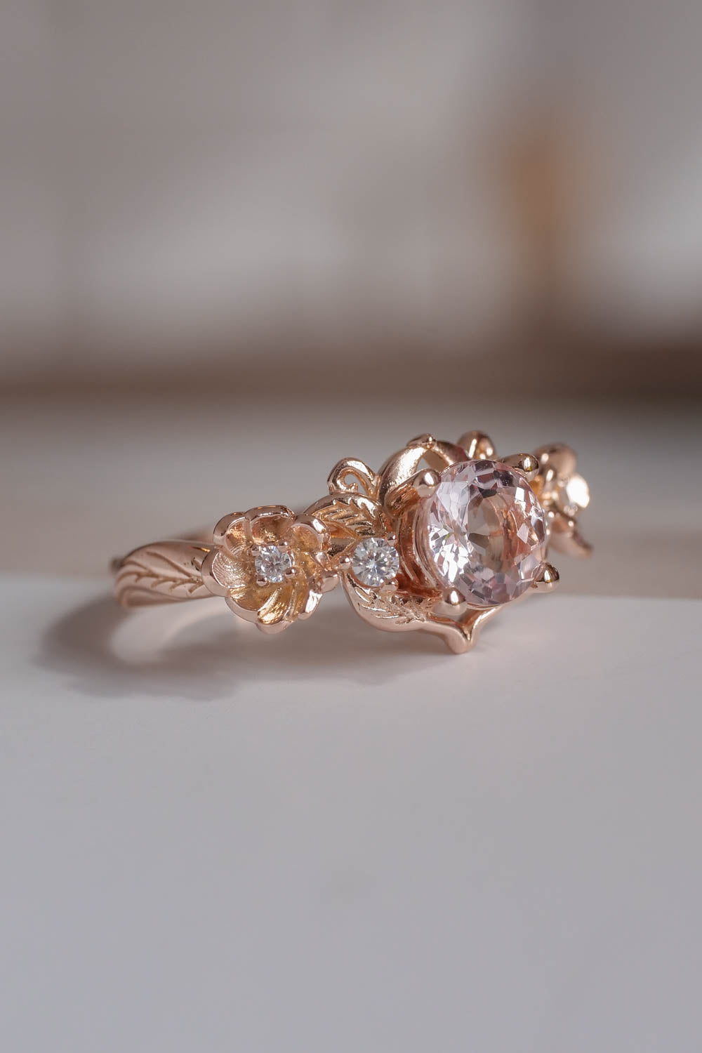Flower engagement ring with pink morganite in rose gold 