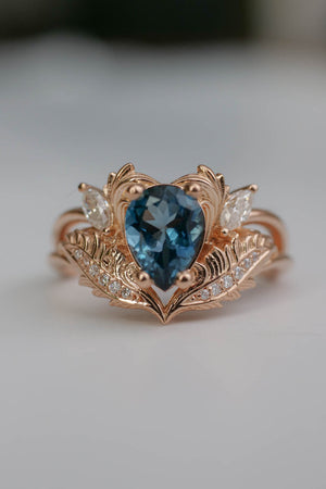 London blue topaz engagement ring in rose gold, pear cut 