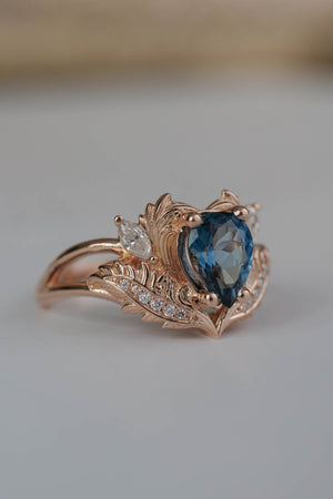 side view of  blue topaz engagement ring