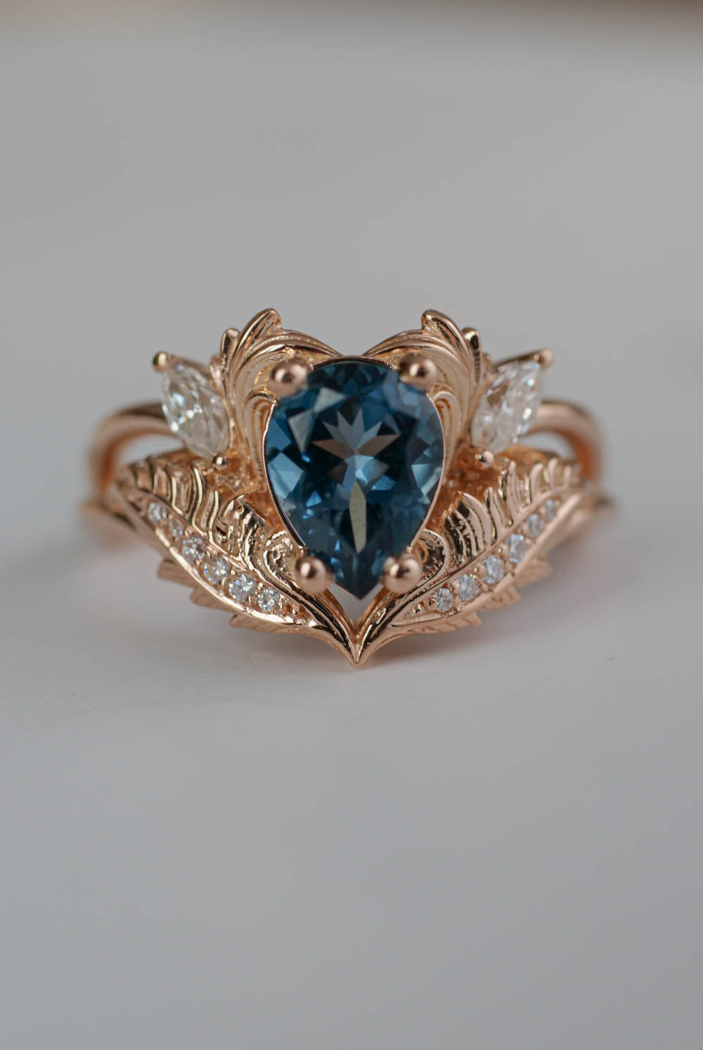 Adonis style engagement ring by Eden Garden Jewelry with london blue topaz, engagement rings in rose gold 