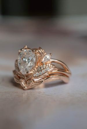 Moissanite engagement ring set in rose gold