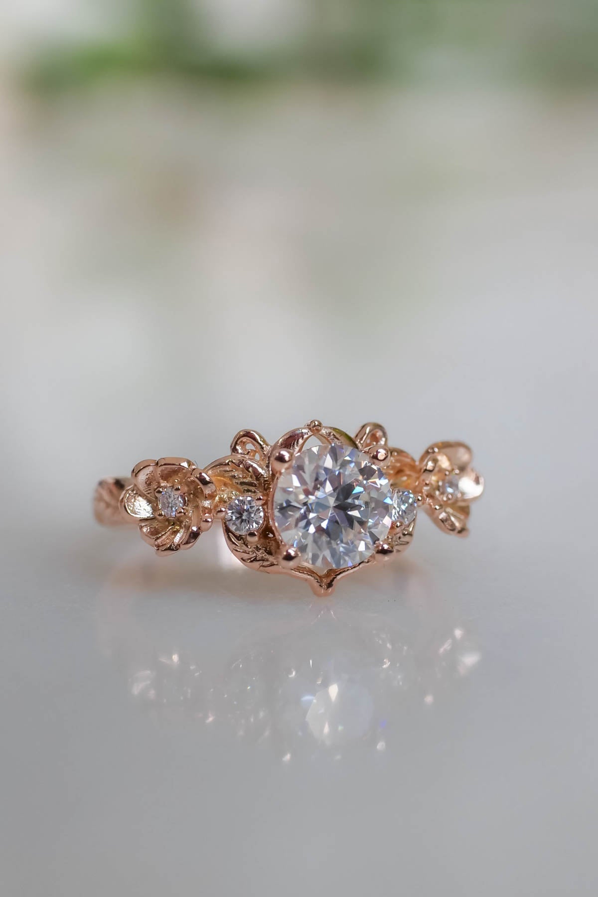 Rose gold moissanite ring for engagement, round cut