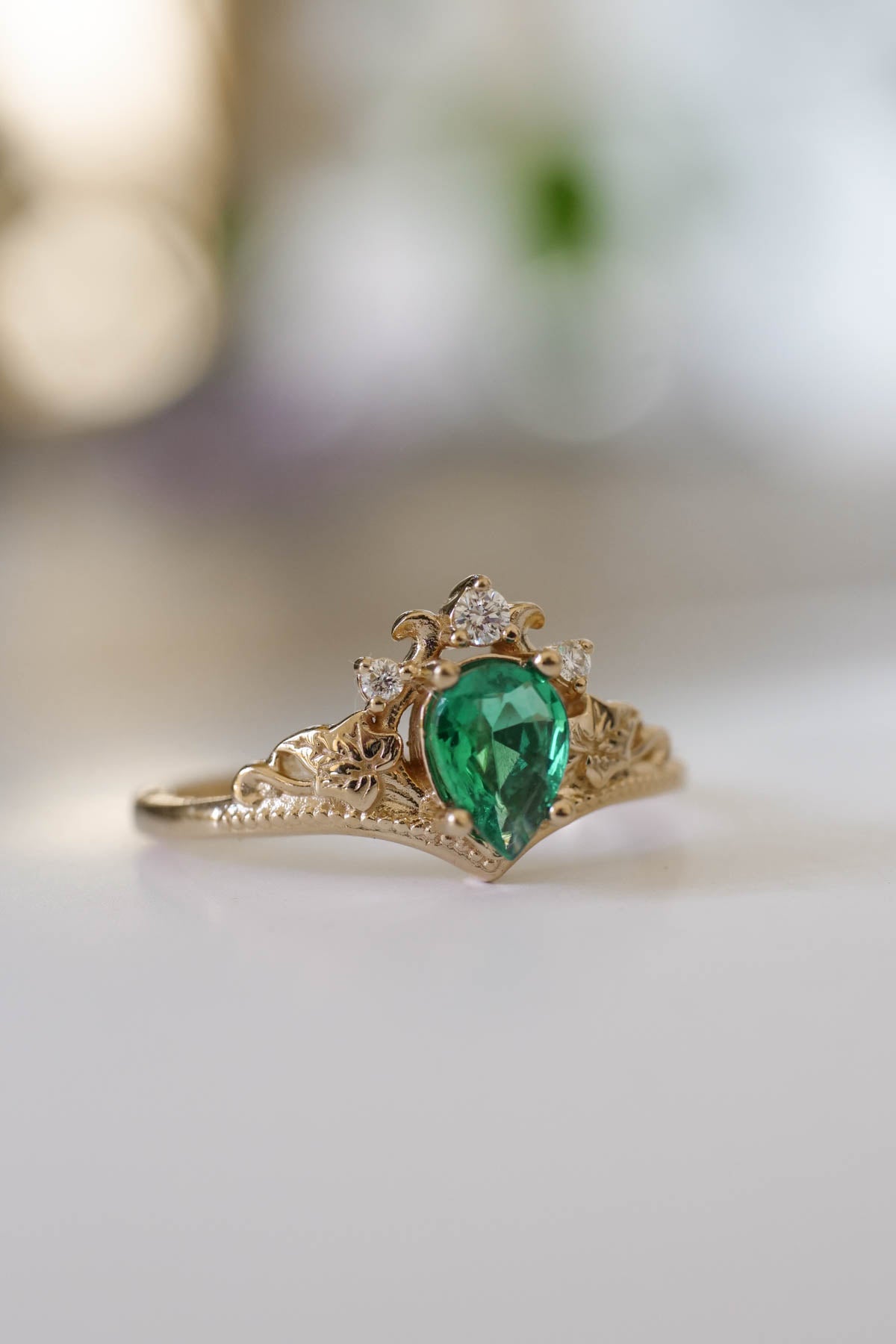 green engagement ring for woman