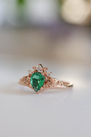 diamond and emerald engagement ring