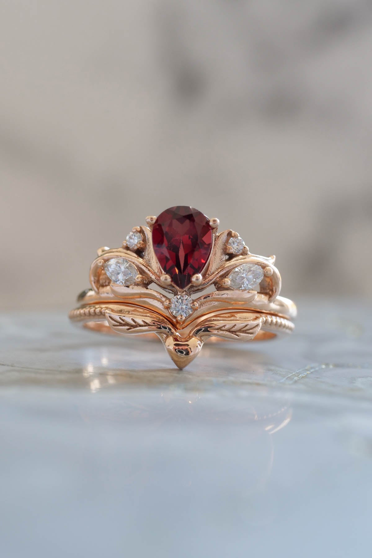 Pear shaped garnet engagement ring, alternative bridal ring set