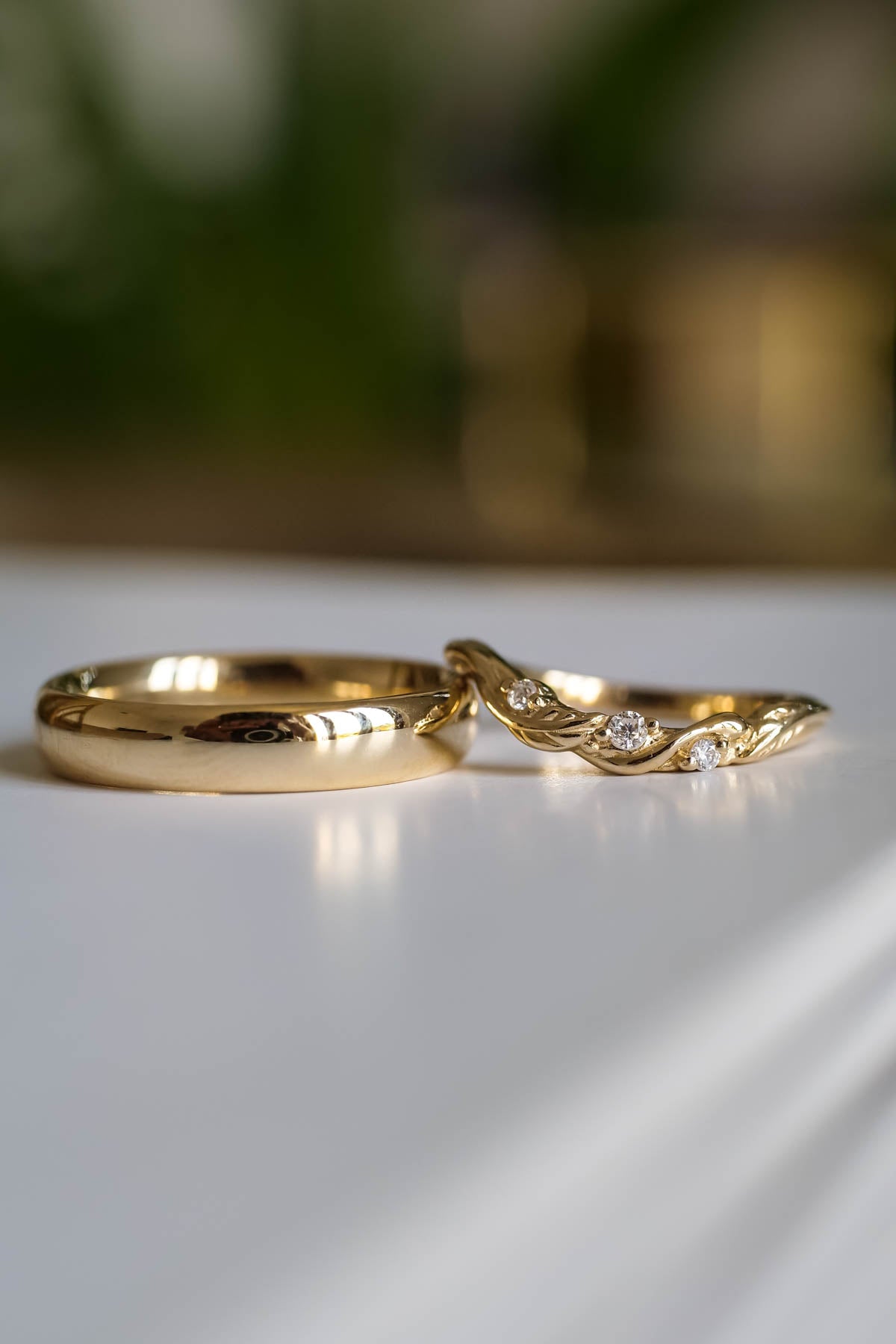 Wedding rings set for couples: classic band for him, curved leaf band for  her