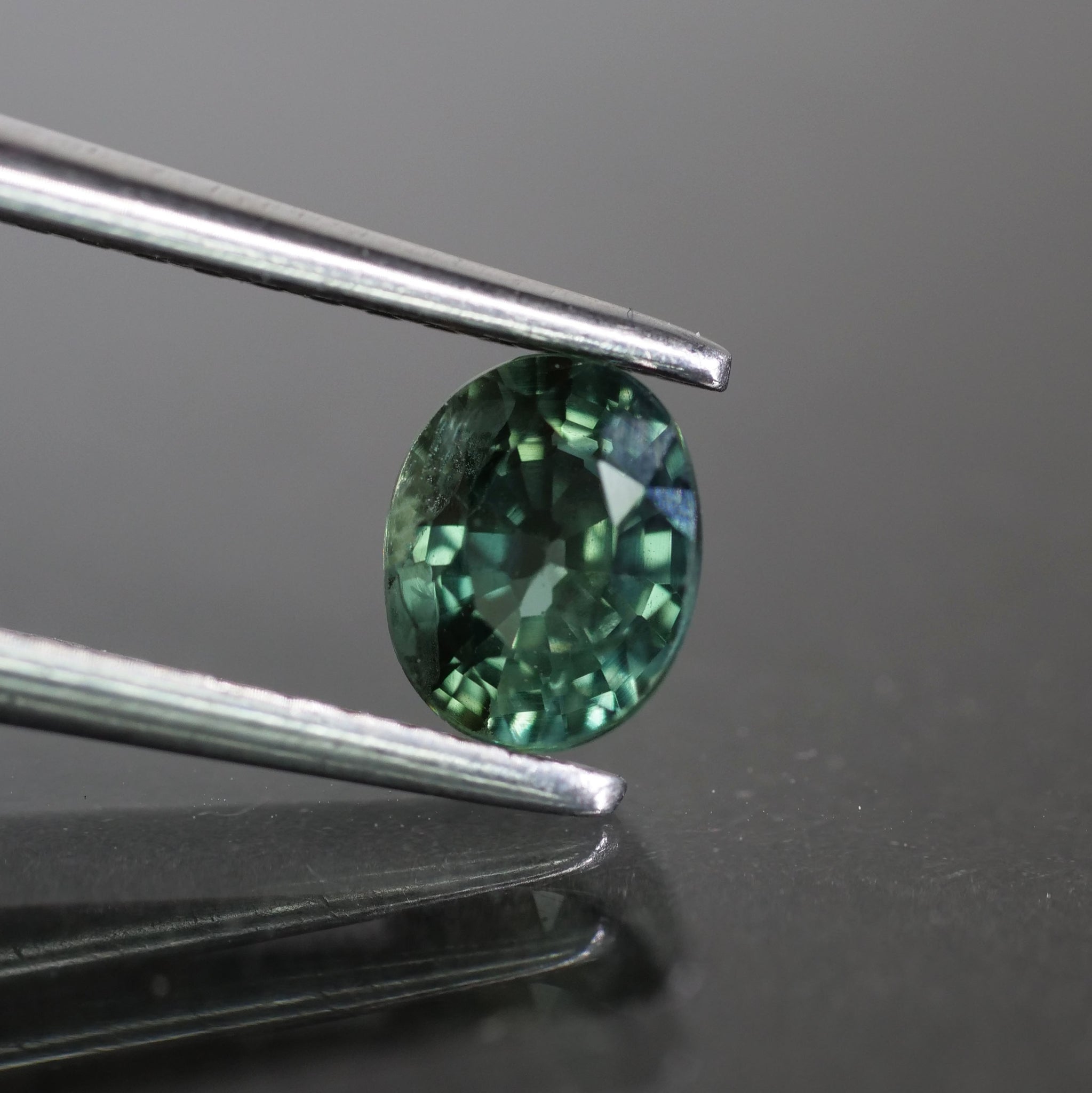 Sapphire | natural, teal (bluish green), oval cut 5x4 mm, VS, 0.6ct, Madagascar - Eden Garden Jewelry™