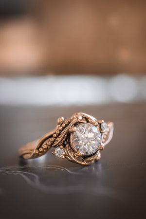 rose gold engagement ring with moissanite