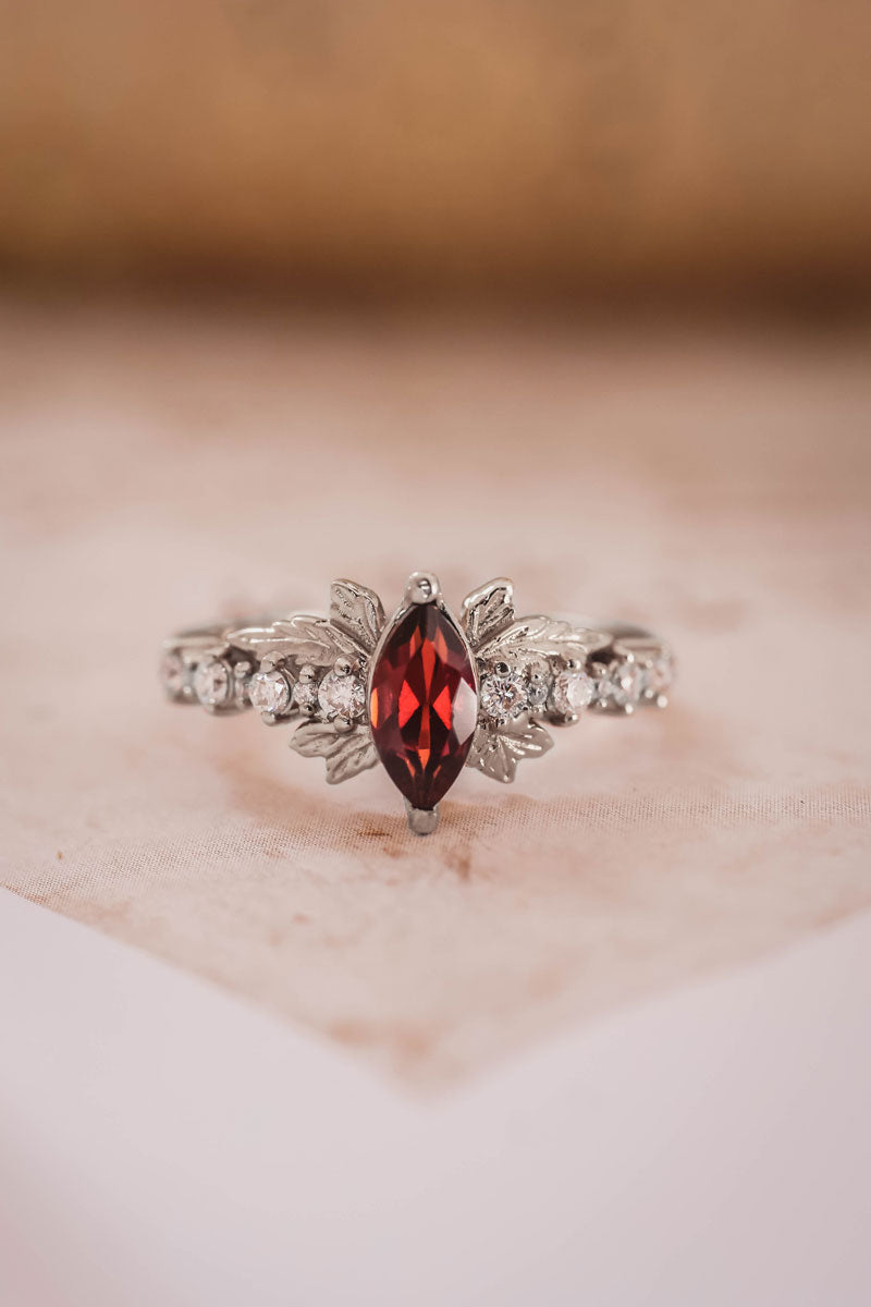 white-gold-engagement-ring-with-garnets